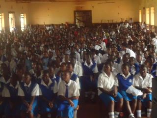 Schoolchildren listening to Mike