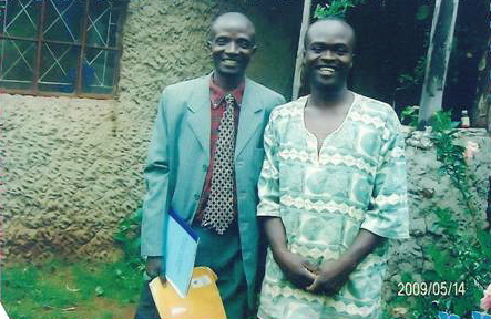 Mike with visiting pastor John Maloba